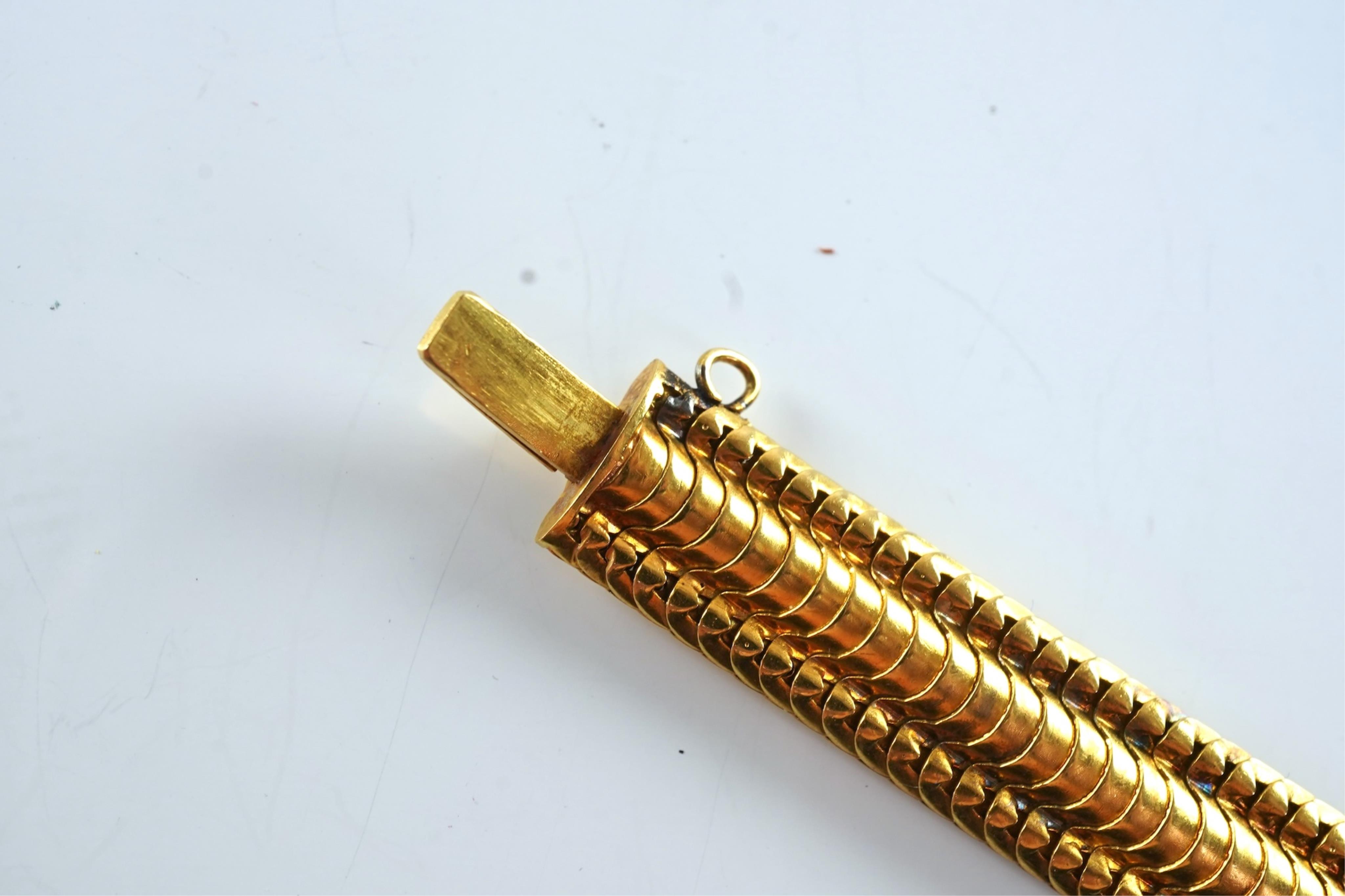 A Victorian gold and ruby bracelet, late 19th century